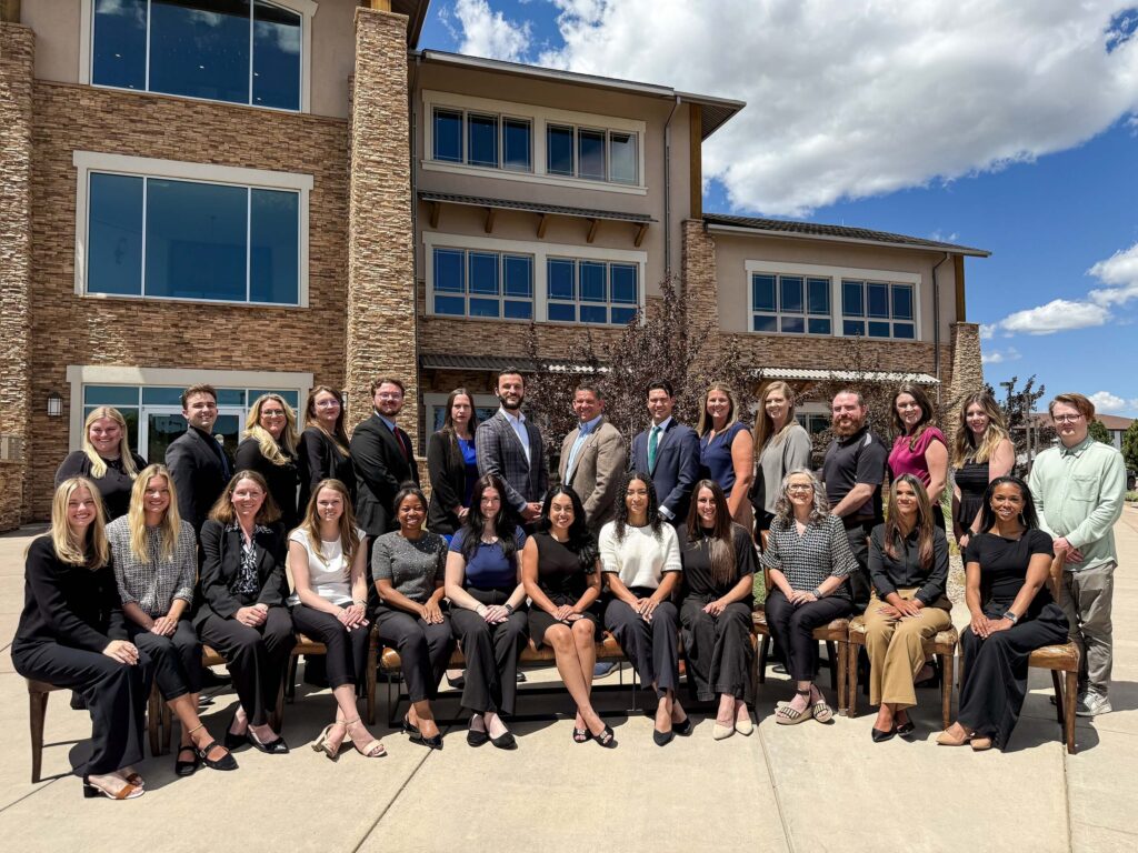 An image of the Mason Law and Planning Group staff in front of the Monument office