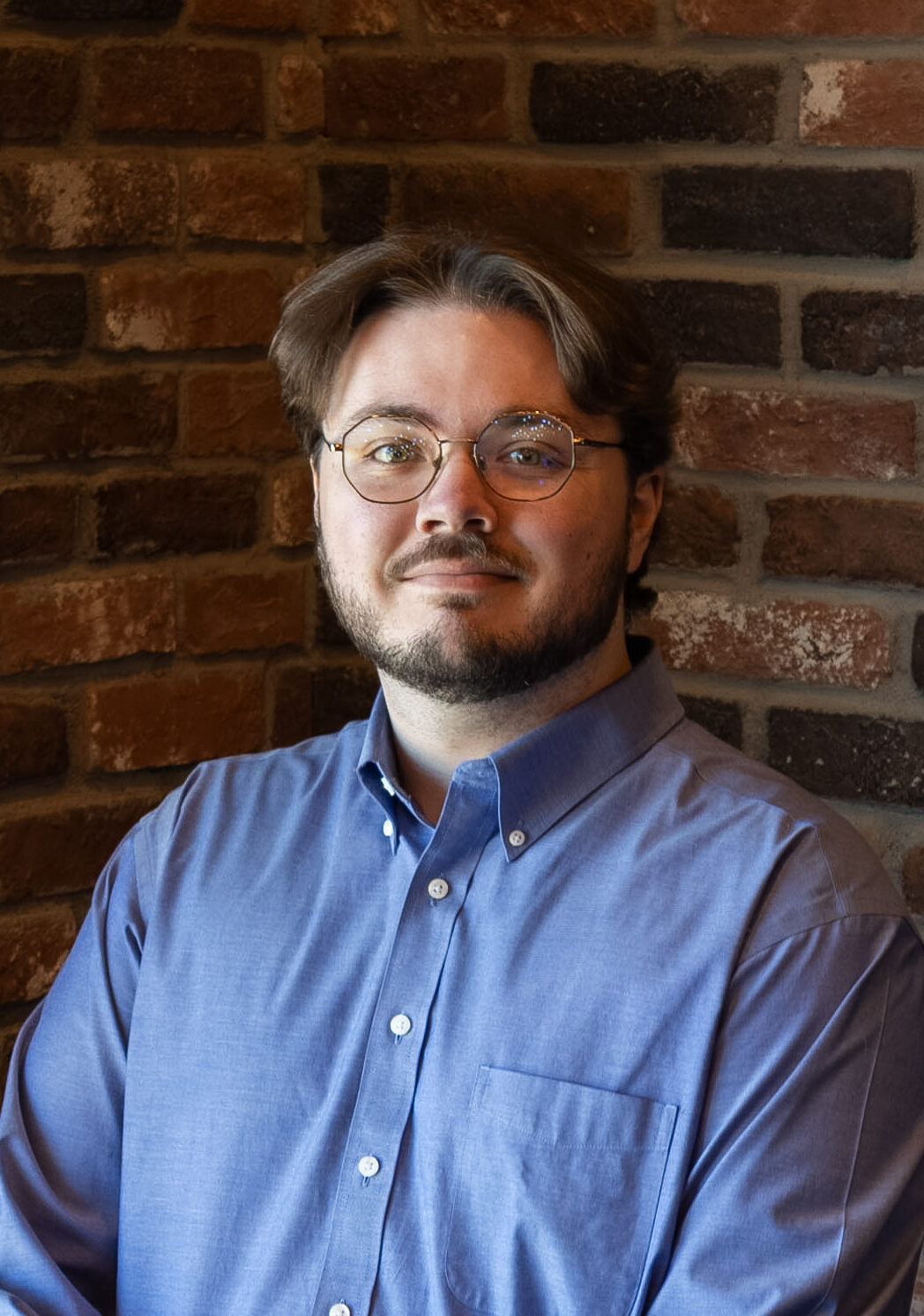 A headshot photo of associate estate planning attorney, Blake McDonald