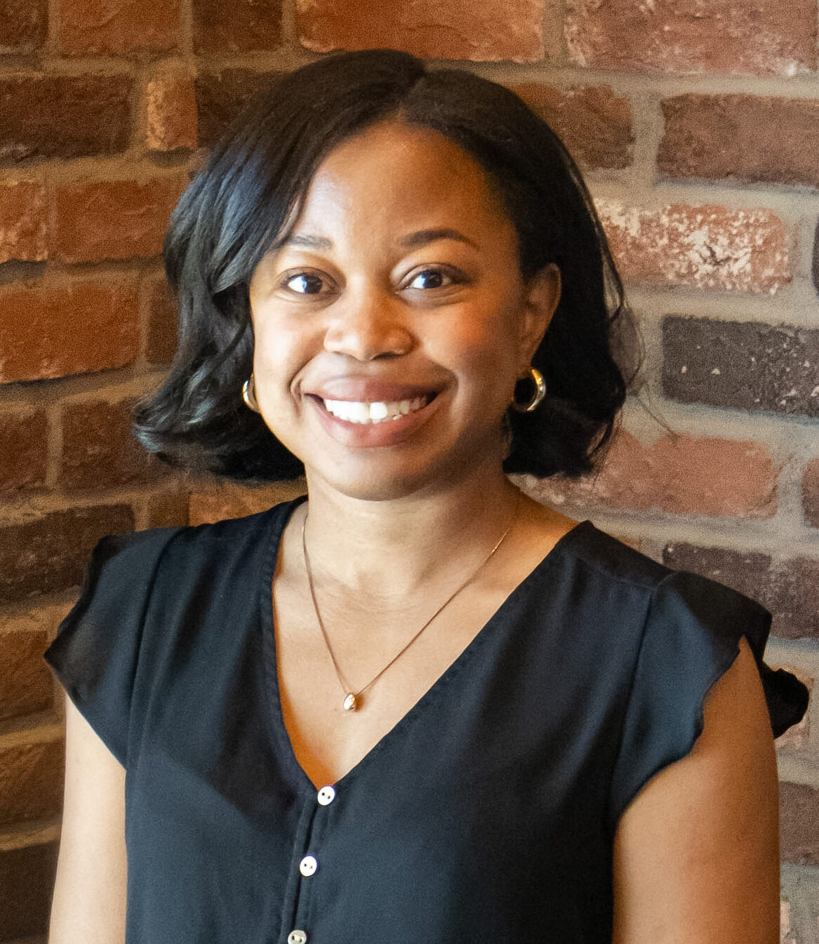 A headshot of Brittany Barney, SEO Specialist.