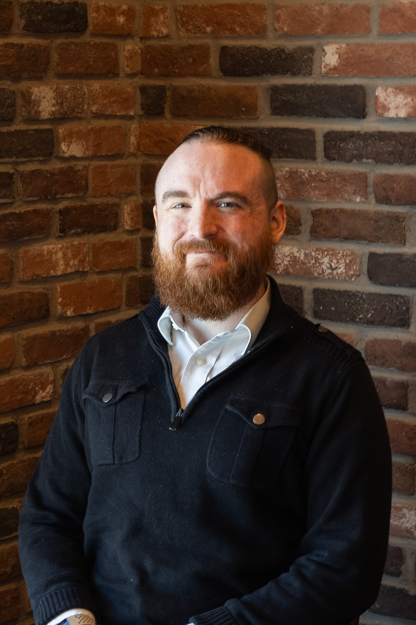 A headshot photo of legal assistant Liam McAleavey