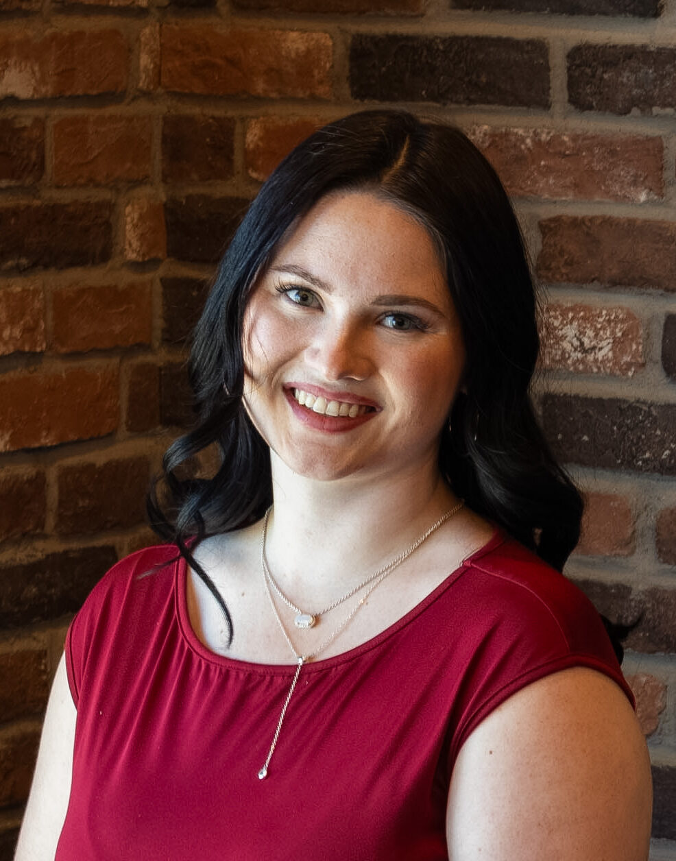 A headshot photo of legal assistant McKayla Garver