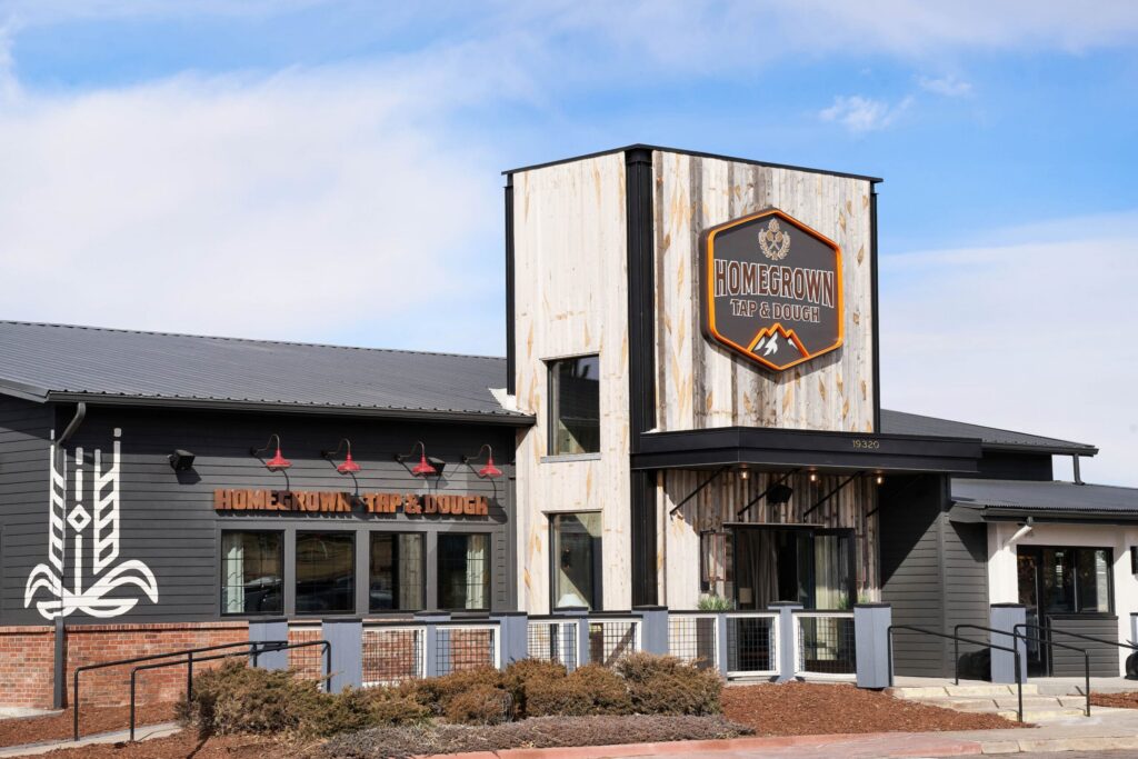 An exterior image of the Homegrown Tap & Dough restaurant in Parker, CO