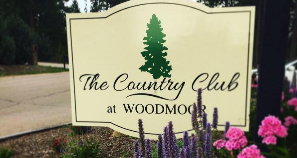 A photo of external signage at The Country Club at Woodmoor in Monument, CO.